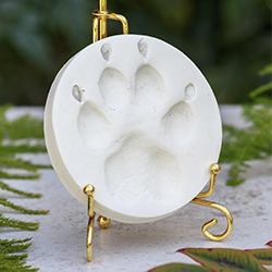 white clay paw print