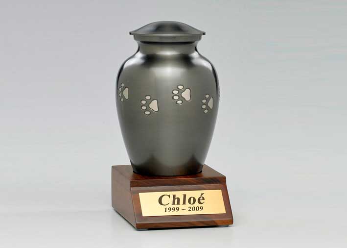 three bronze paw print vase urns